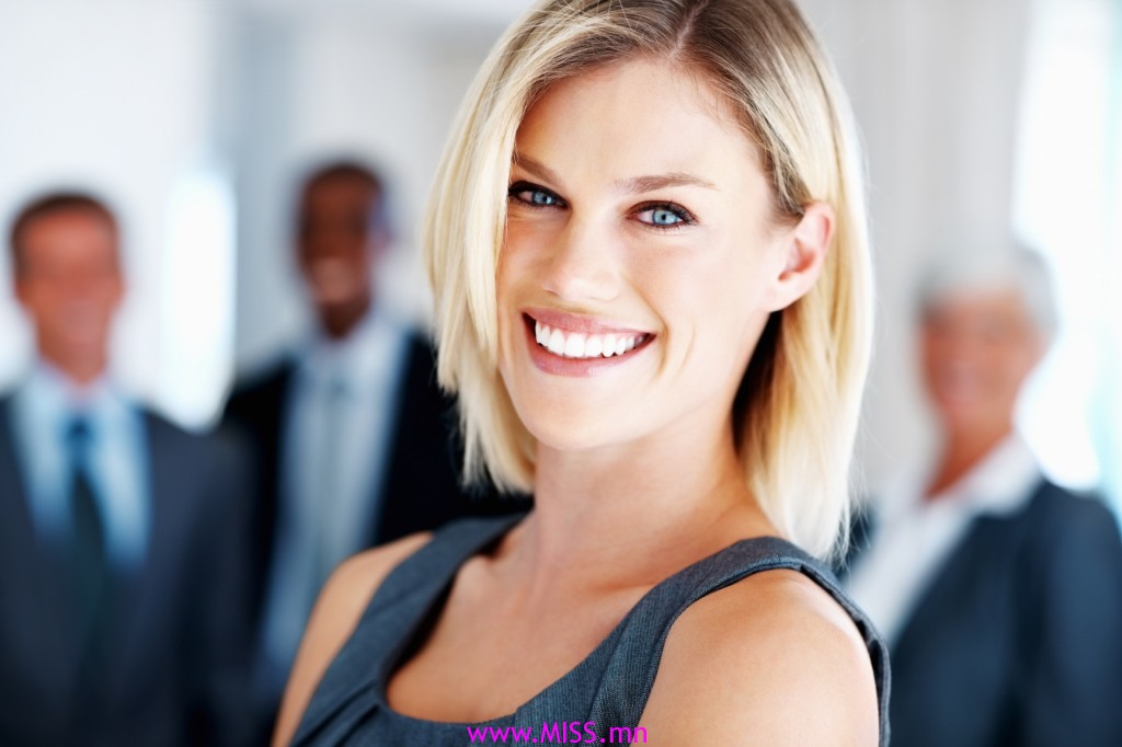 stockfresh_1243442_elegant-business-woman-with-team_sizeM